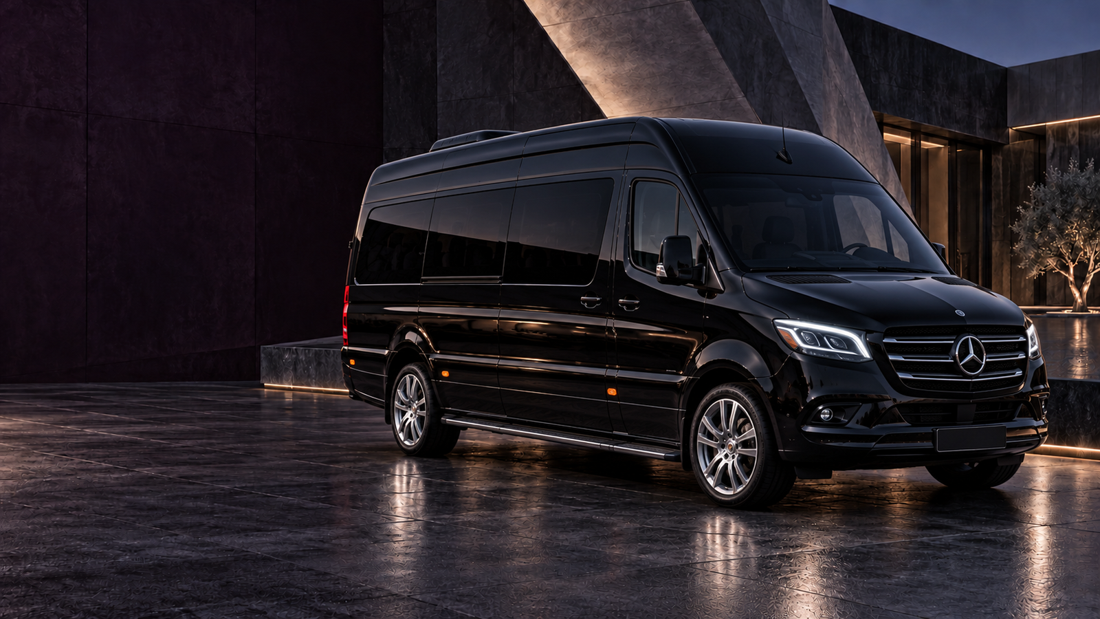 Black executive Sprinter van at blue hour